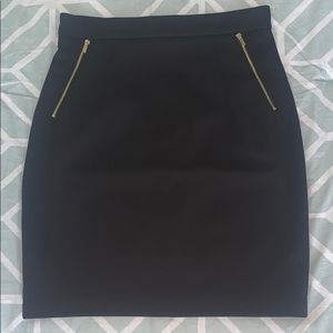 Black pencil skirt with gold finishings